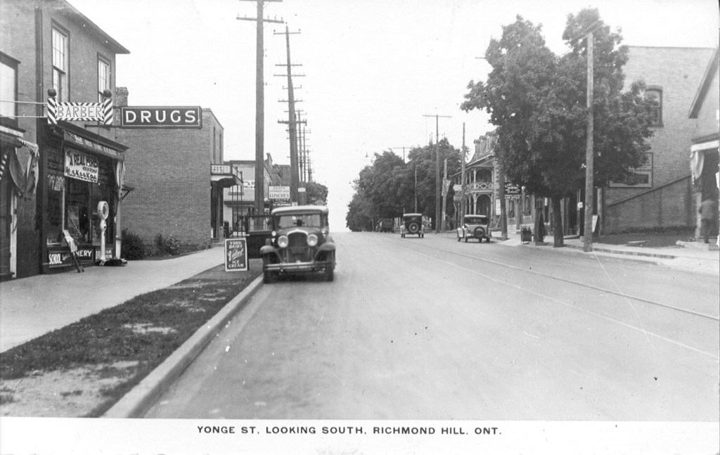 Yonge Street looking south taken around 1930. The Palmer House Hotel is on the right side of the road by the two cars. (photo courtesy of Richmond Hill Public Library, PA92-005)