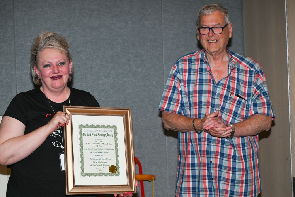Image of RHHS President Jim Vollmershausen awarding the Bert Hunt Heritage Award to Vera Tachtaul at the Society's June 2024 meeting. (photograph by Chris Robart)